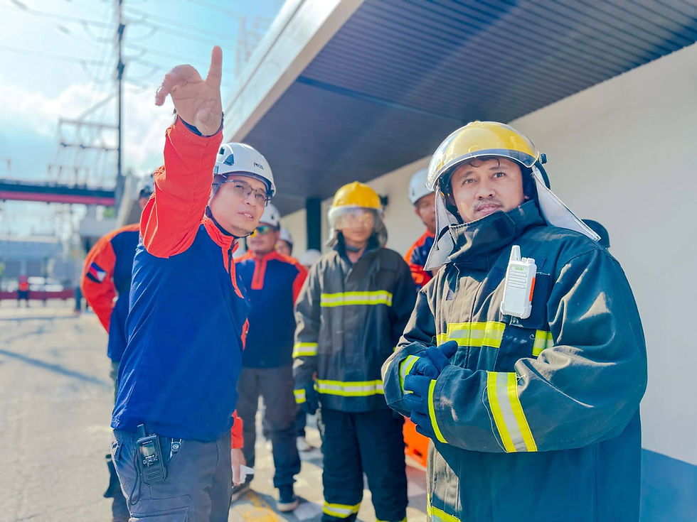 SHES Manager of Visayan Electric Engr. Benje Retuertas (left) leading the Emergency Response Team of Visayan Electric during the fire drill held at the company compound in Banilad, Cebu City.