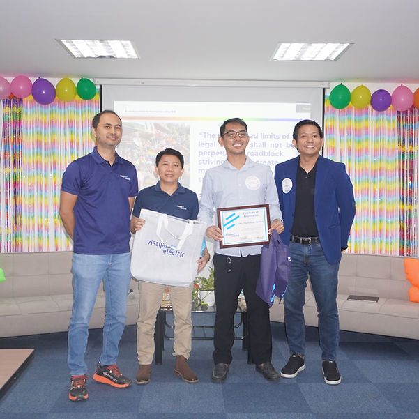 HAPPY PRIDE: (from the left) Visayan Electric President and GM Engr. Mark Anthony Kindica; Accounts Receivable Specialist Boneville Manatad, LGBTQIA+ rights advocate Atty. King Perez; and Visayan Electric Legal Affairs Manager Atty. Ernie Villarin during the DEIB forum at Visayan Electric.